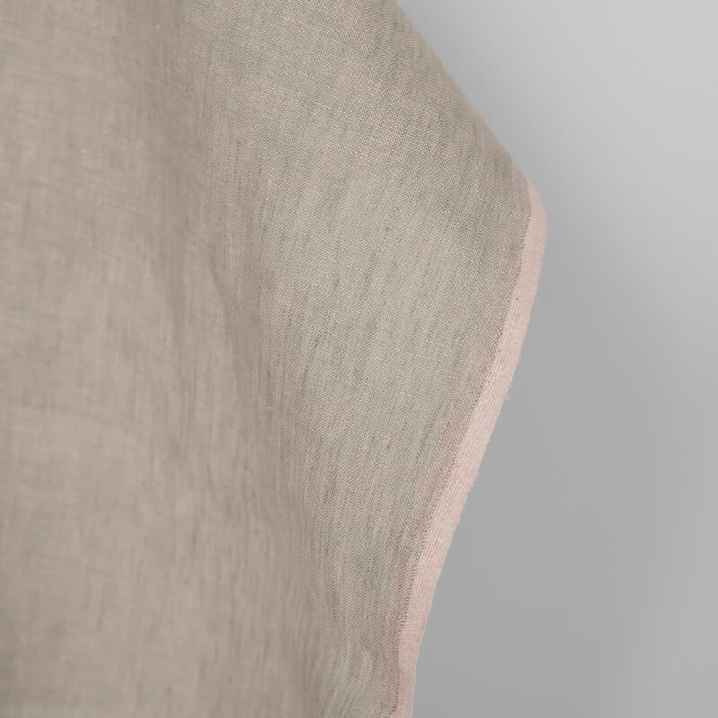 Linen fabric green lilac melange, fabric edge