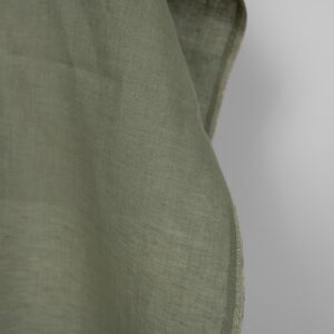 Linen fabric grey green melange, fabric edge