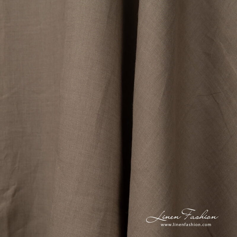Wide linen fabric greyish brown colour close up detail