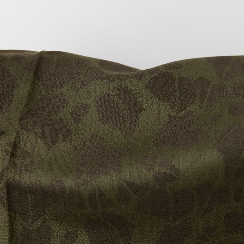 Green linen blend jacquard fabric close up detail
