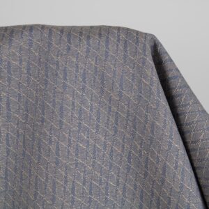 Linen cotton fabric blueish brown patterned close up detail