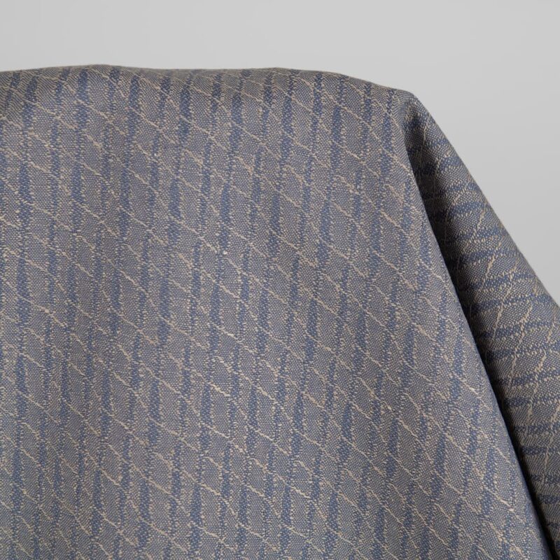 Linen cotton fabric blueish brown patterned close up detail