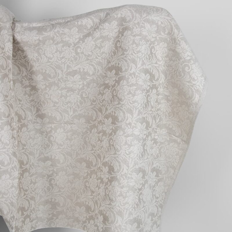 Undyed linen and white cotton fabric with flowers
