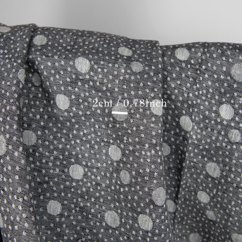 Black linen fabric in bubble pattern with measurements