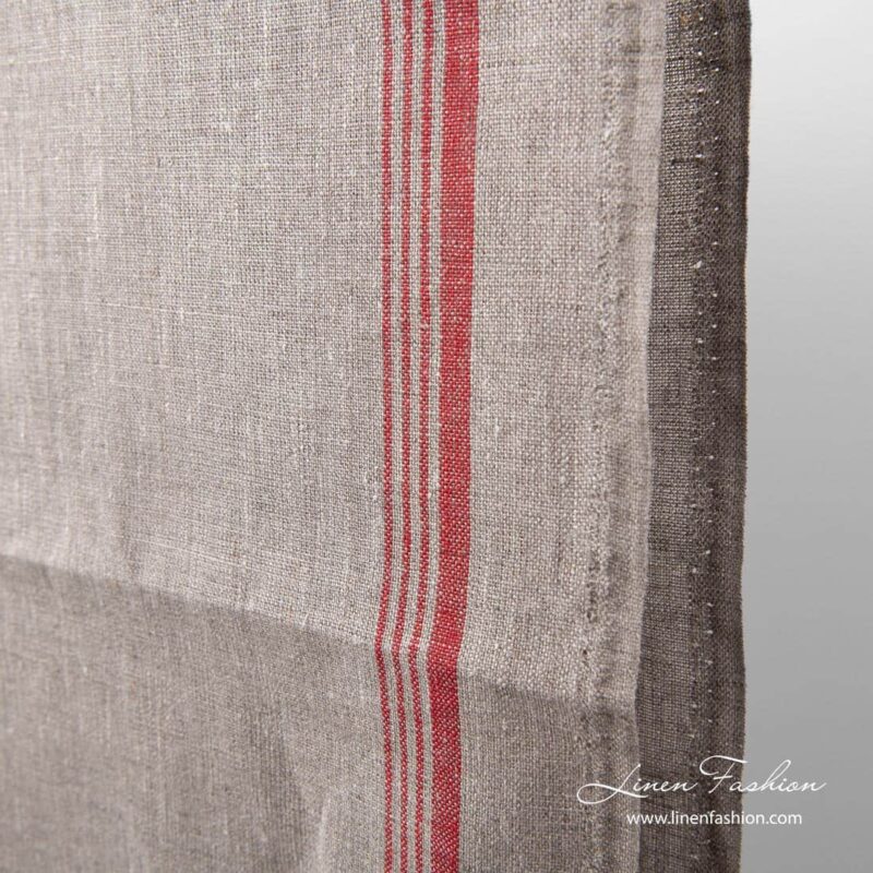 Narrow grey linen fabric with red stripe on one side