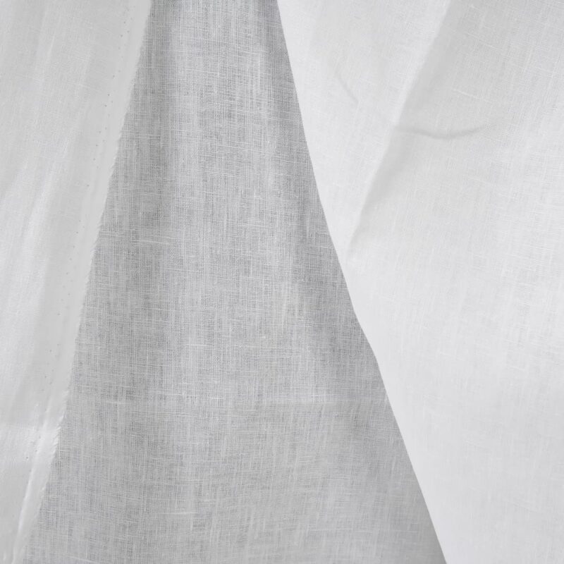 Heavy linen fabric bright white colour close up edge