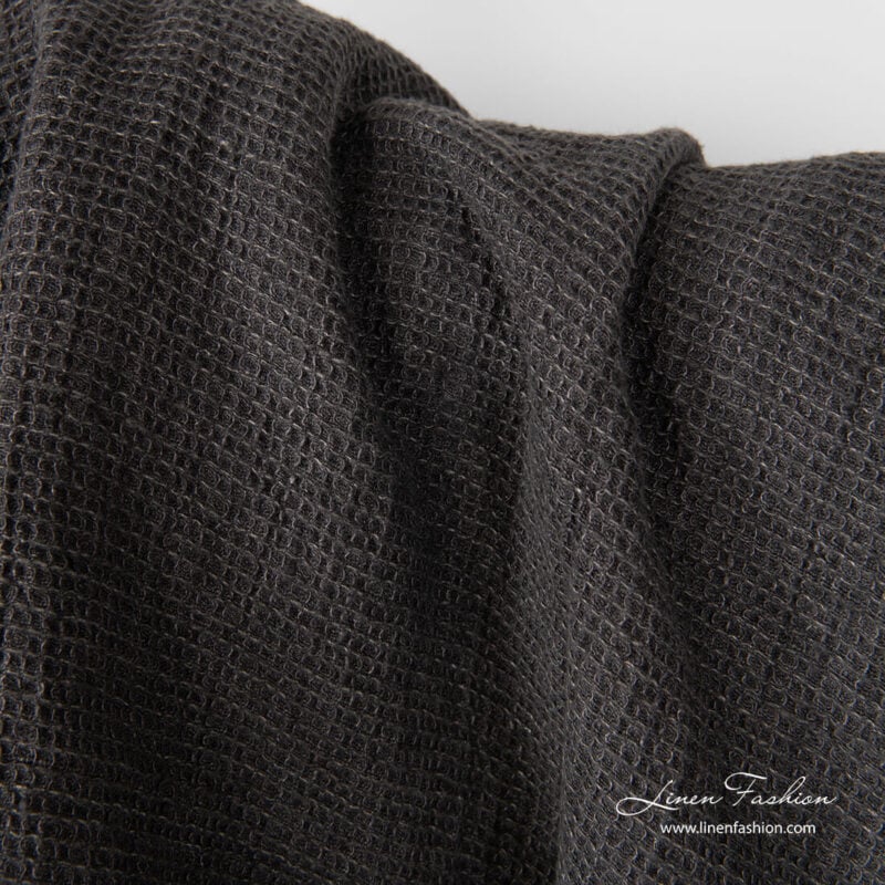 Dark grey linen fabric in waffle weave, washed