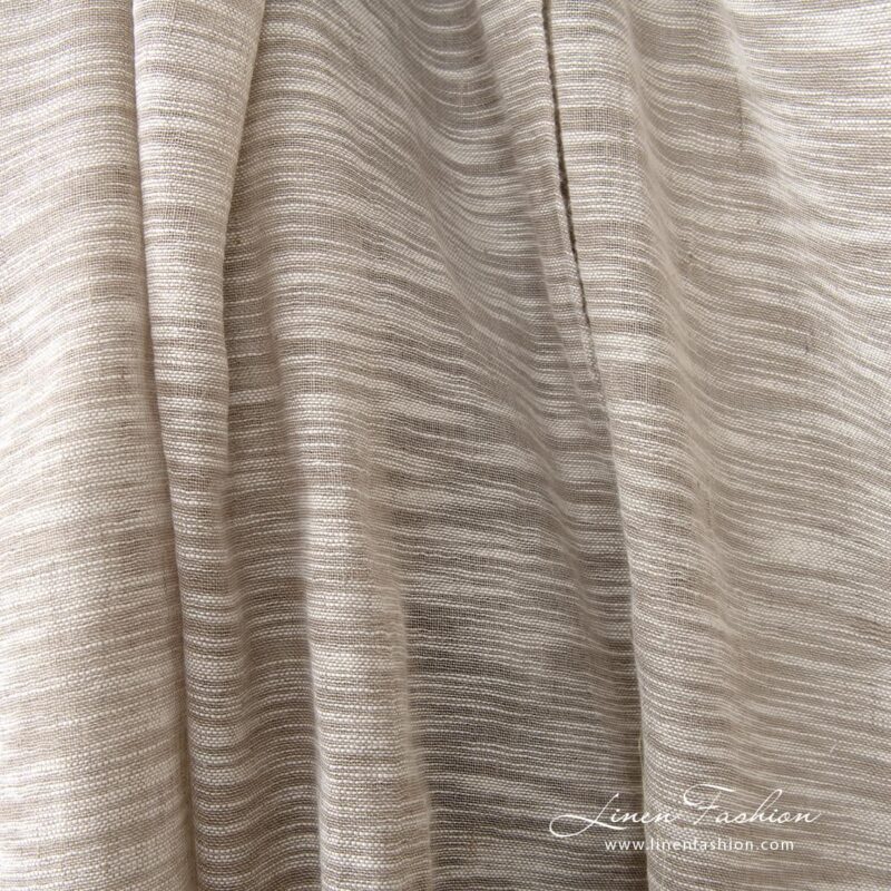 Linen cotton fabric sand colour with white stripes close up detail