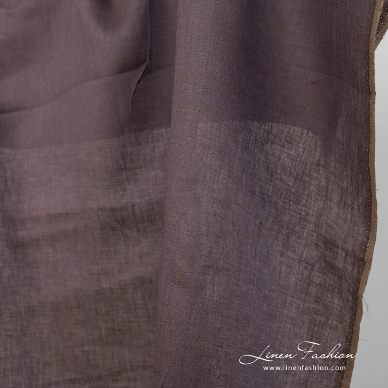 Lightweight linen fabric brownish purple colour edge view