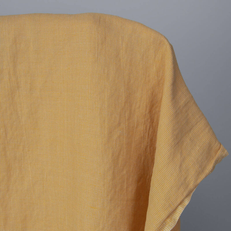 Washed linen cotton fabric in yellow-sand small pattern 145cm