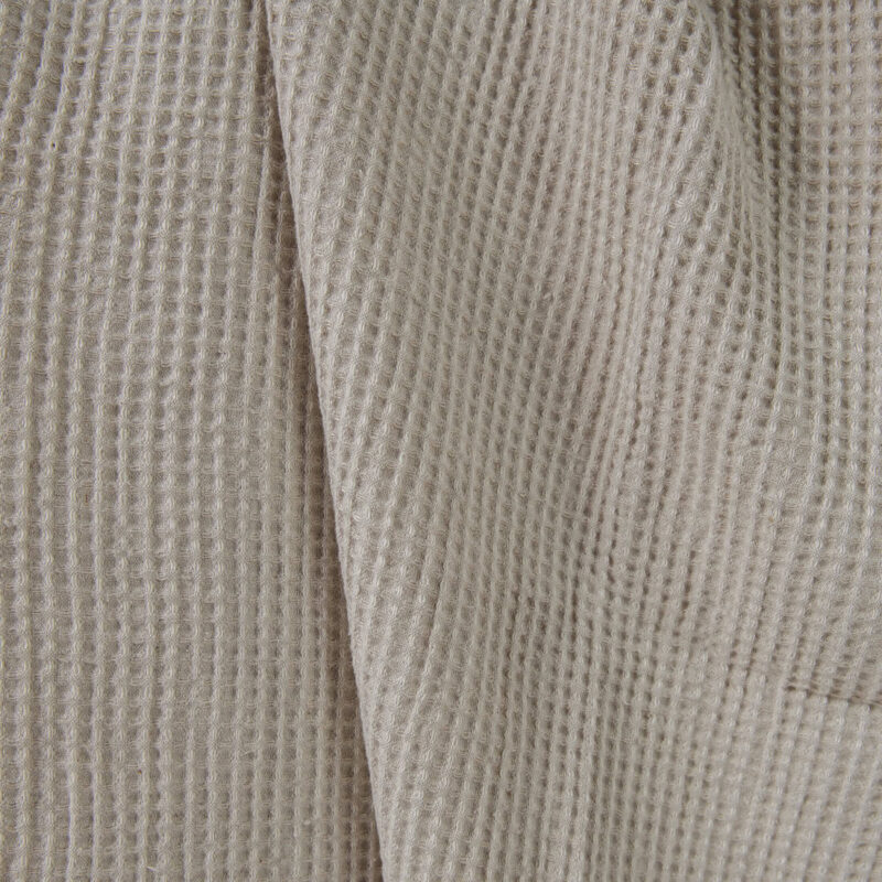 Washed linen cotton fabric beige waffle close up detail