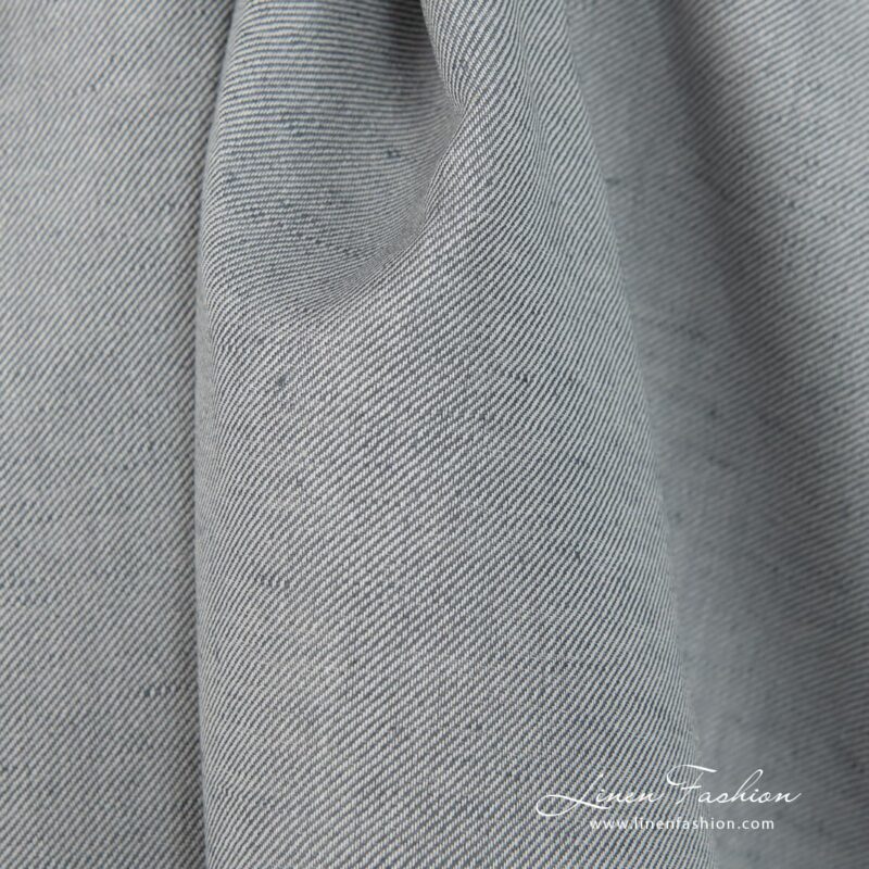 Linen cotton fabric blueish grey twill weave close up detail