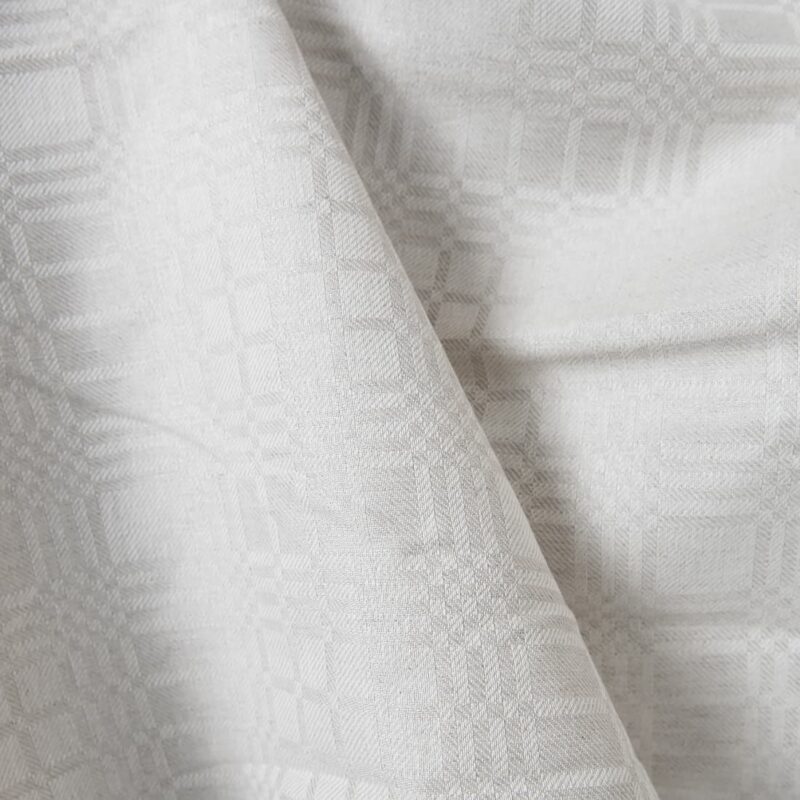 Linen cotton fabric in light beige checks detail view
