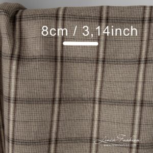 Brown coloured linen cotton fabric.