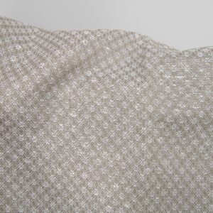 Linen cotton fabric dark beige and white diamonds close up detail