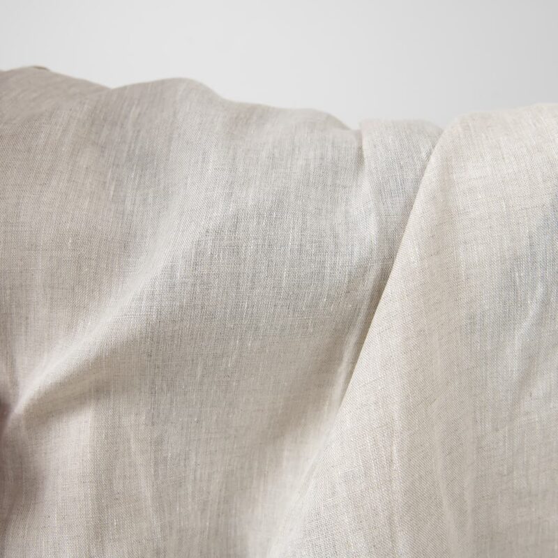 Pure linen fabric in light grey close up detail