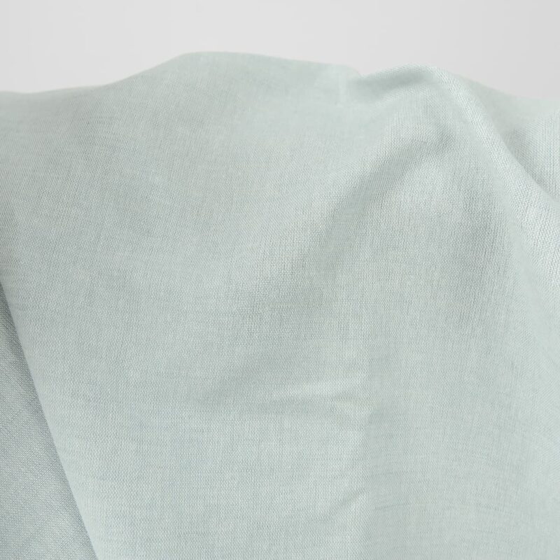 Wide linen cotton fabric pale turquoise colour close up view