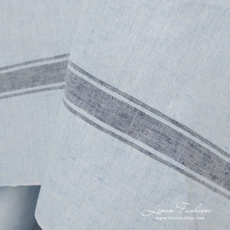 Light blue fabric in stripes.