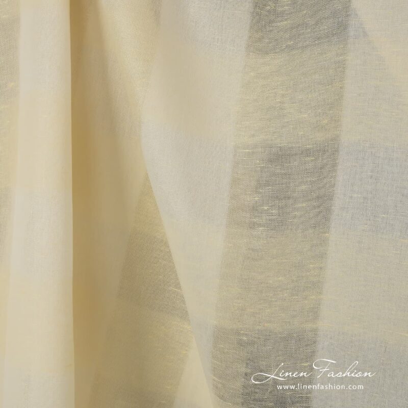 Pale yellow linen cotton fabric.
