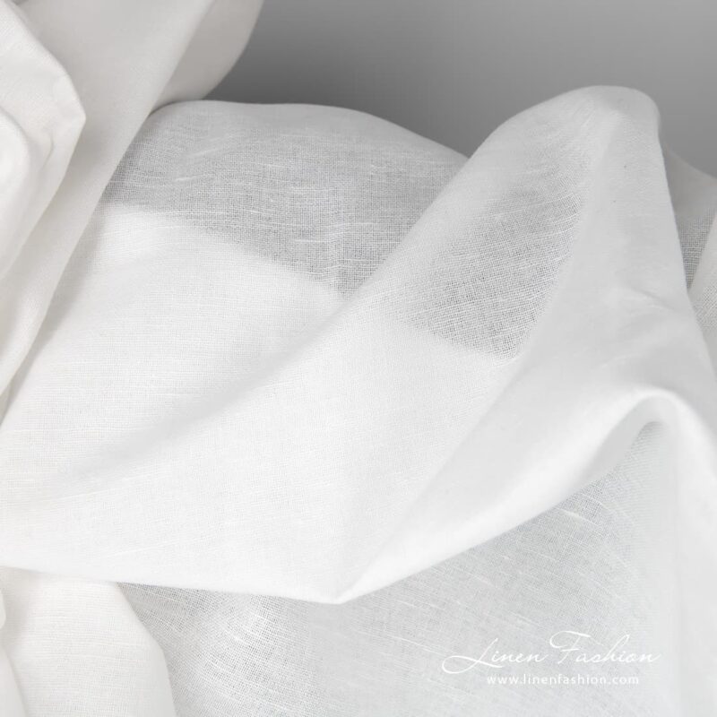 Wide lightweight, plainly-woven off-white linen / cotton fabric for sewing a variety of home decor items