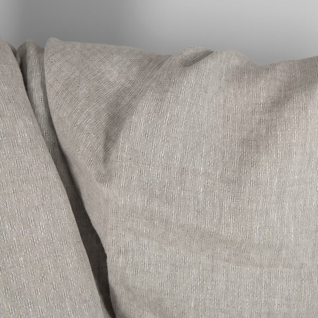 Tkanina lniana beżowa w ażurową kratkę 2 Openwork patterned linen fabric in beige close up detail