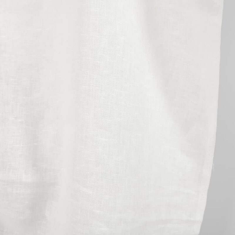 Pure linen fabric in off-white edge