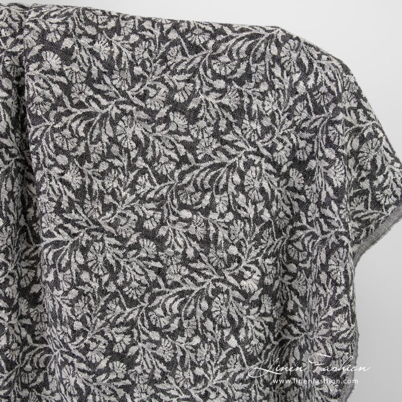 Black linen cotton jacquard fabric with flowery ornaments, washed