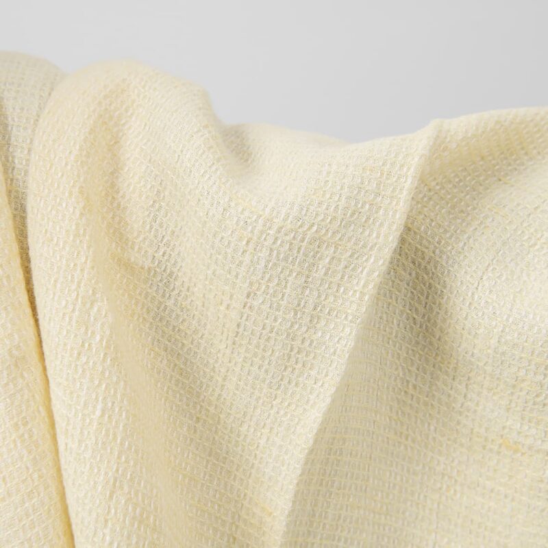Pale yellow waffle linen fabric washed texture