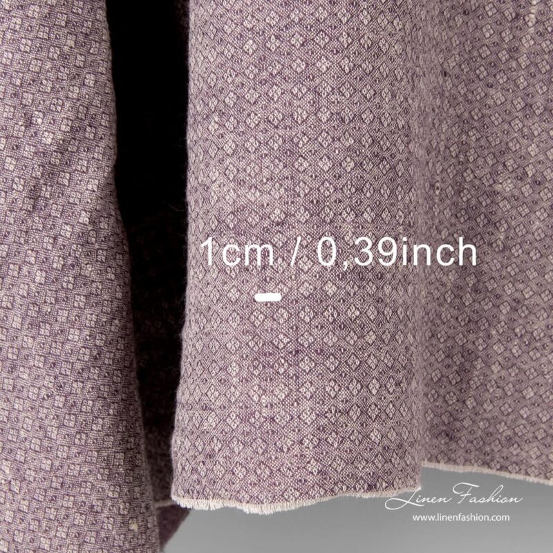 Washed purple linen fabric in small diamond pattern with measurements
