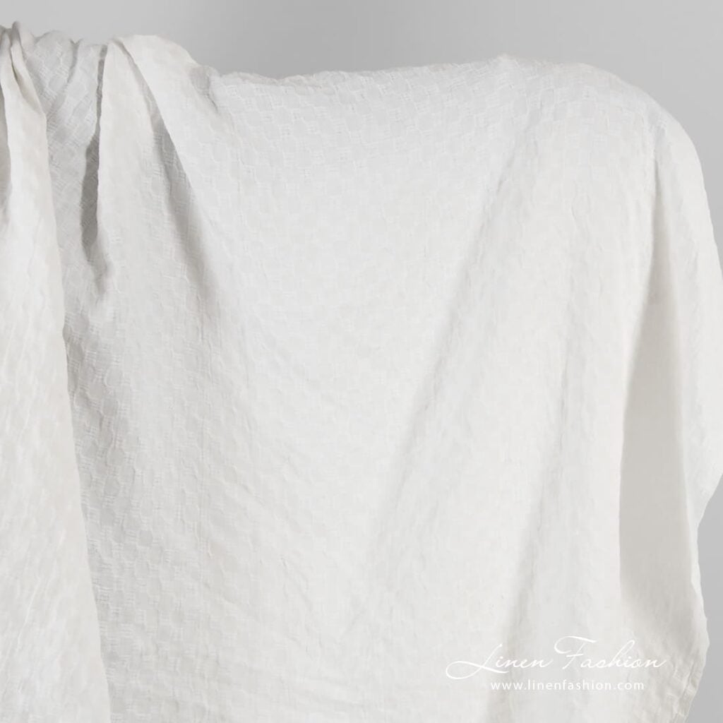 Optical white linen fabric in checks