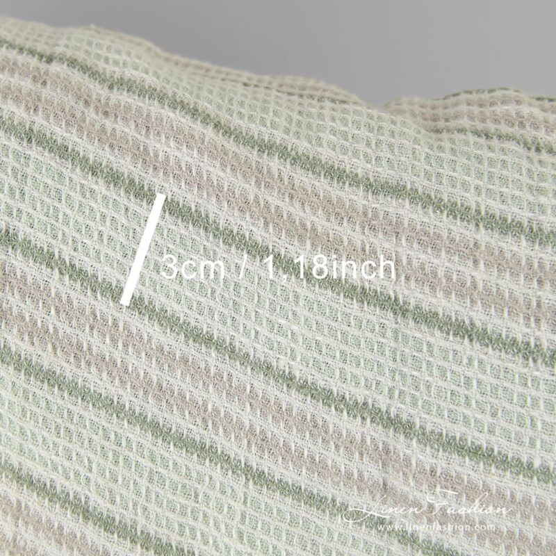 Linen fabric in horizontal stripes and waffle pattern