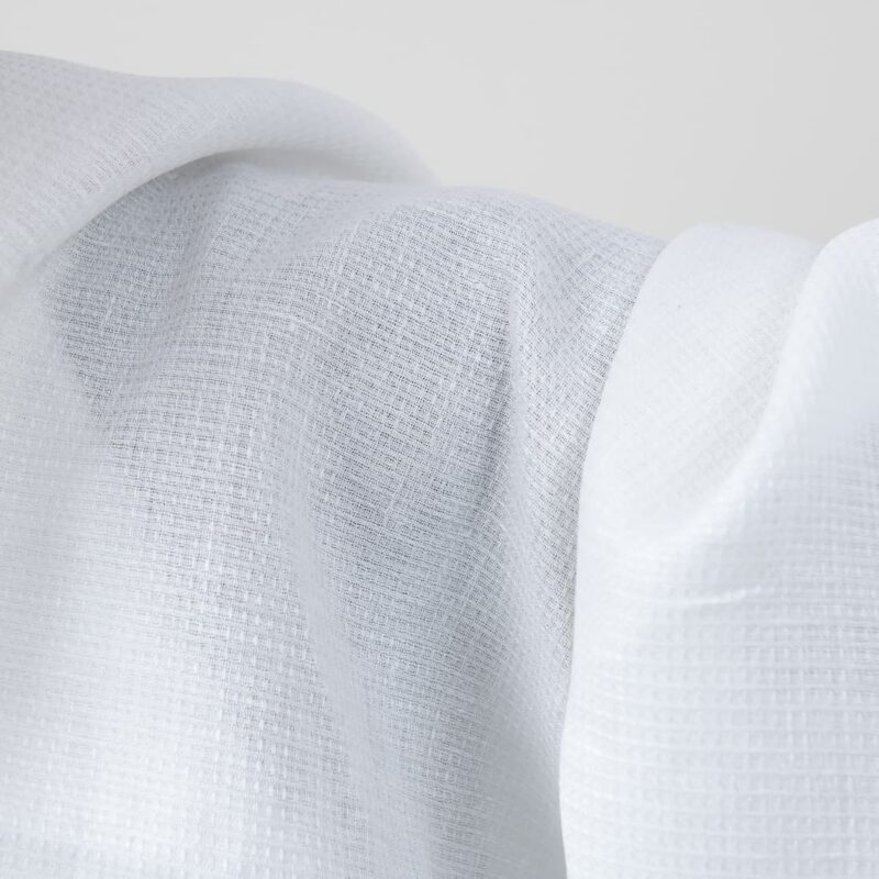 Bright white linen fabric in a small check pattern texture