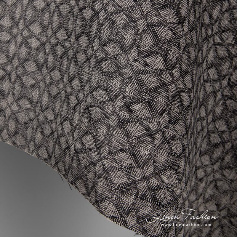 Geometrical black grey linen fabric.