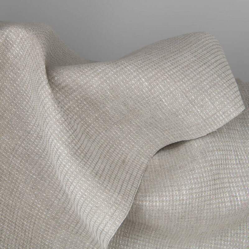 Linen fabric made from grey (natural linen) and white yarns