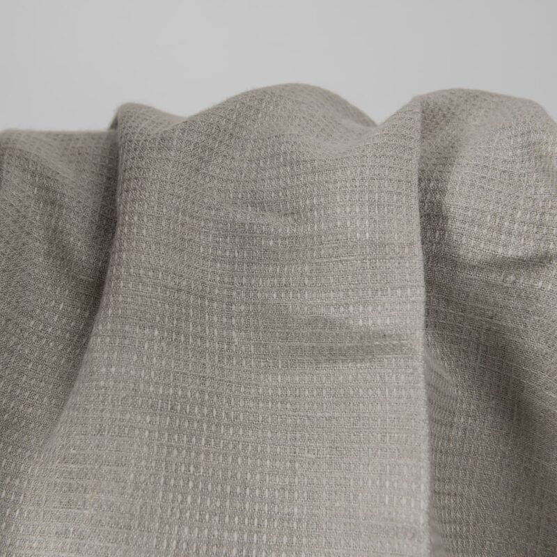 Checked linen fabric in grey natural flax colour texture