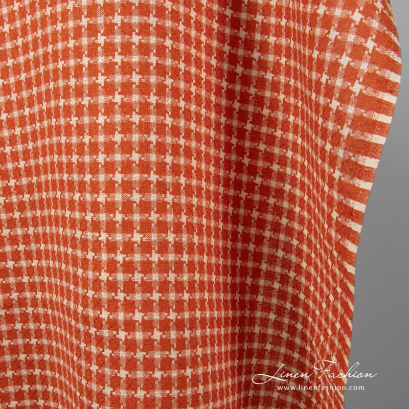 Pure linen fabric in red color.