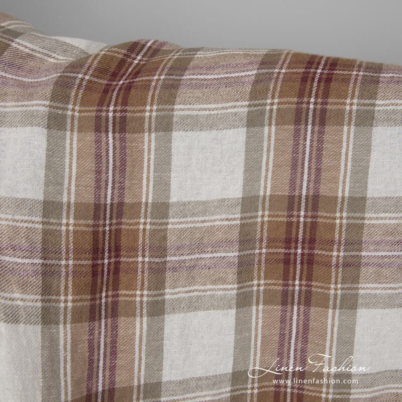 Wide washed half linen fabric off-white with brown checks close up detail