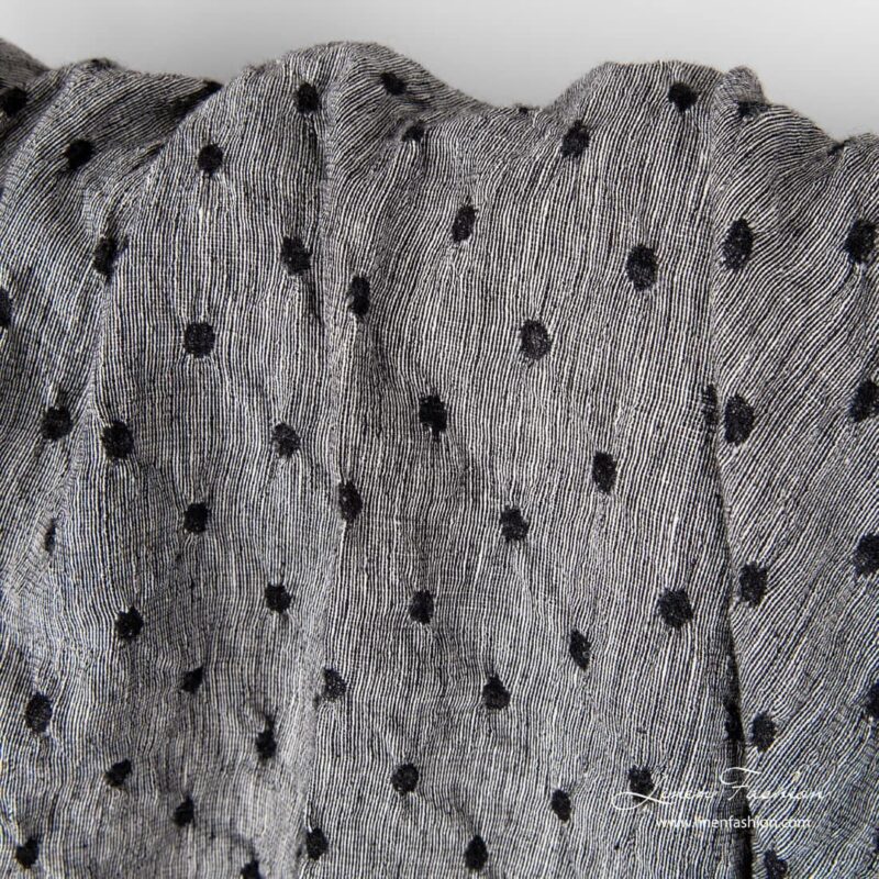 Washed black white linen wool fabric.