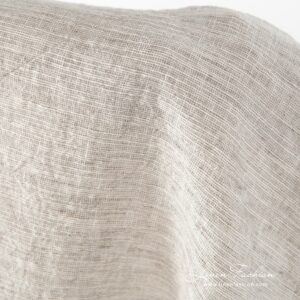Grey-brownish wide linen-cotton fabric.
