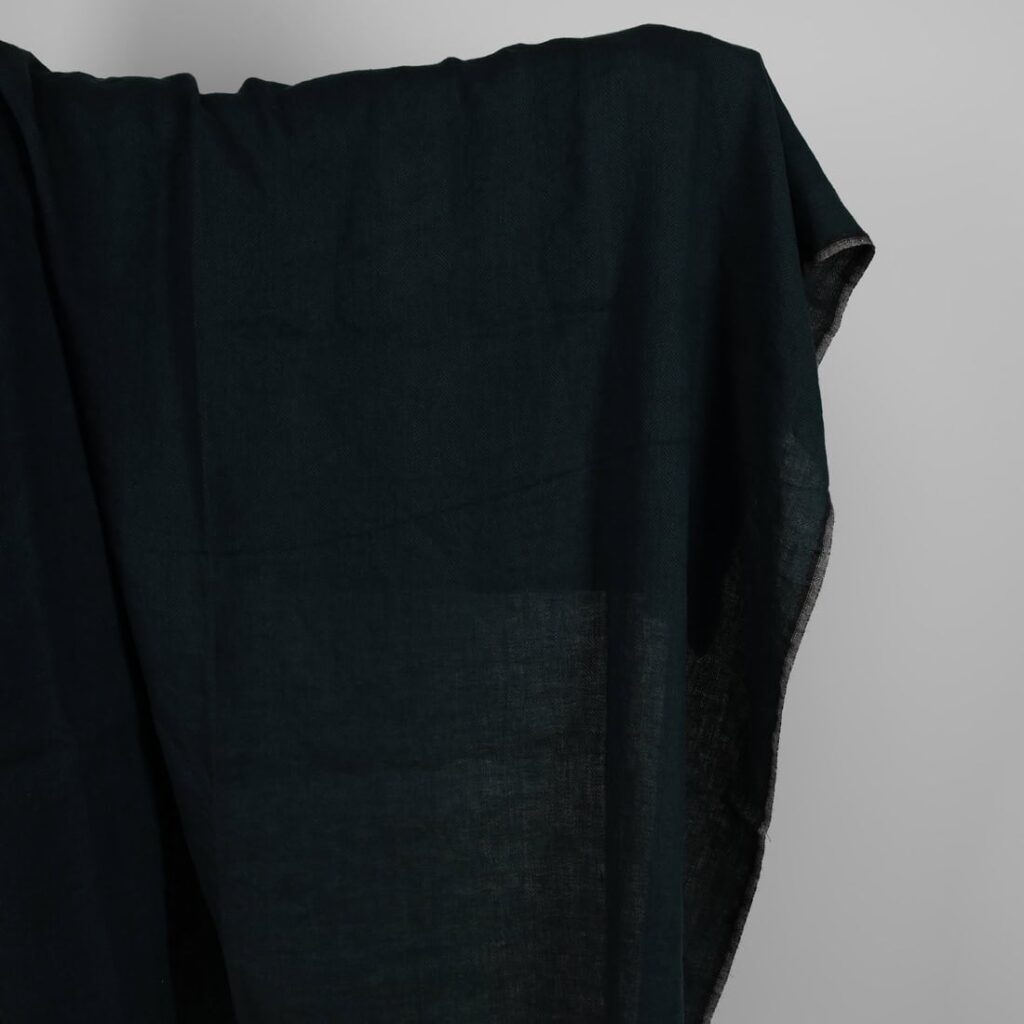Washed linen wool fabric black in herringbone pattern