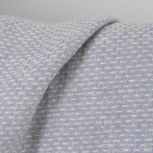 Washed linen wool fabric violet and white small pattern, close up view