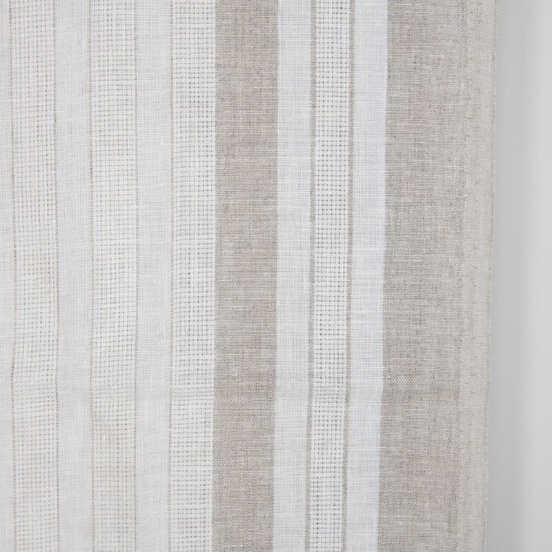 White linen fabric with undyed natural linen stripes close up photo