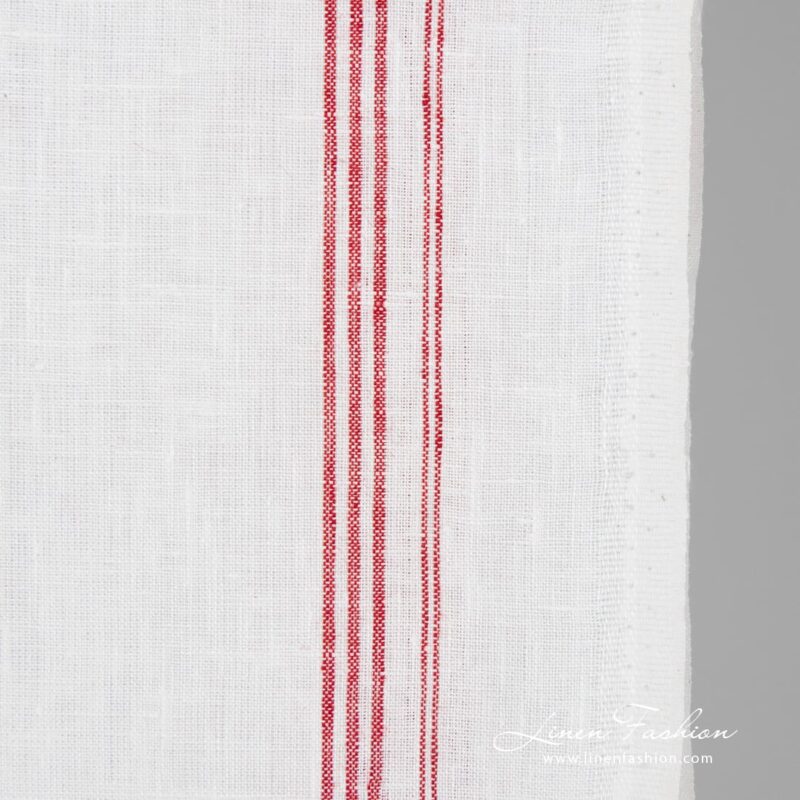 White linen fabric in crimson stripes