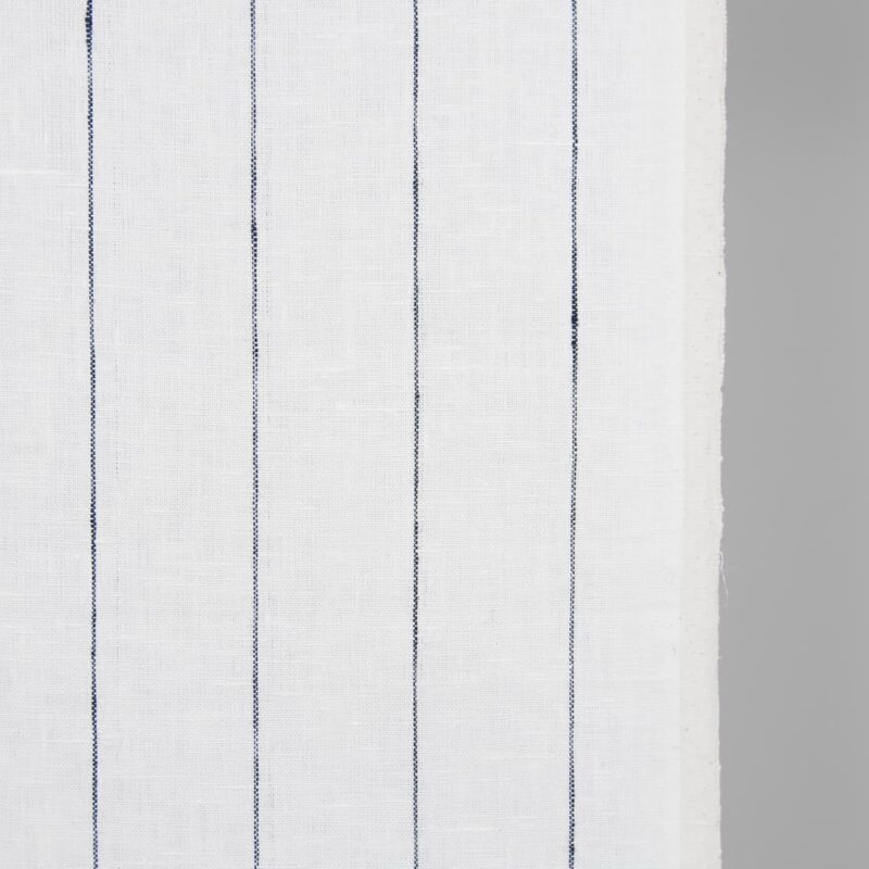Narrow linen fabric white with thin blue stripes close up detail
