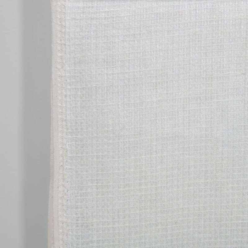 Narrow linen fabric off-white waffle close up detail