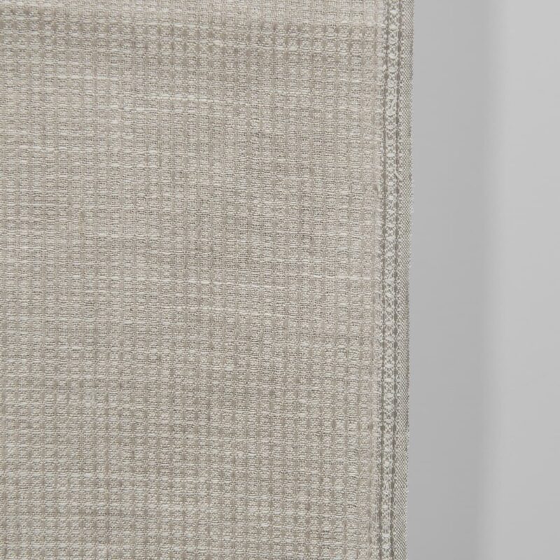 Narrow linen fabric natural and off-white waffle close up detail