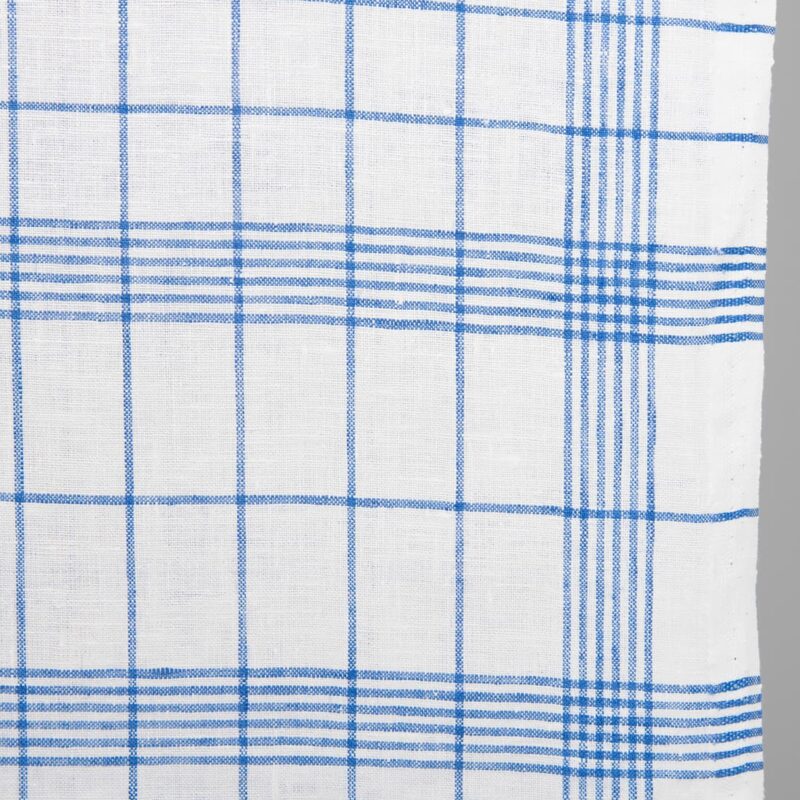 Narrow linen fabric bright white with blue checks close up detail