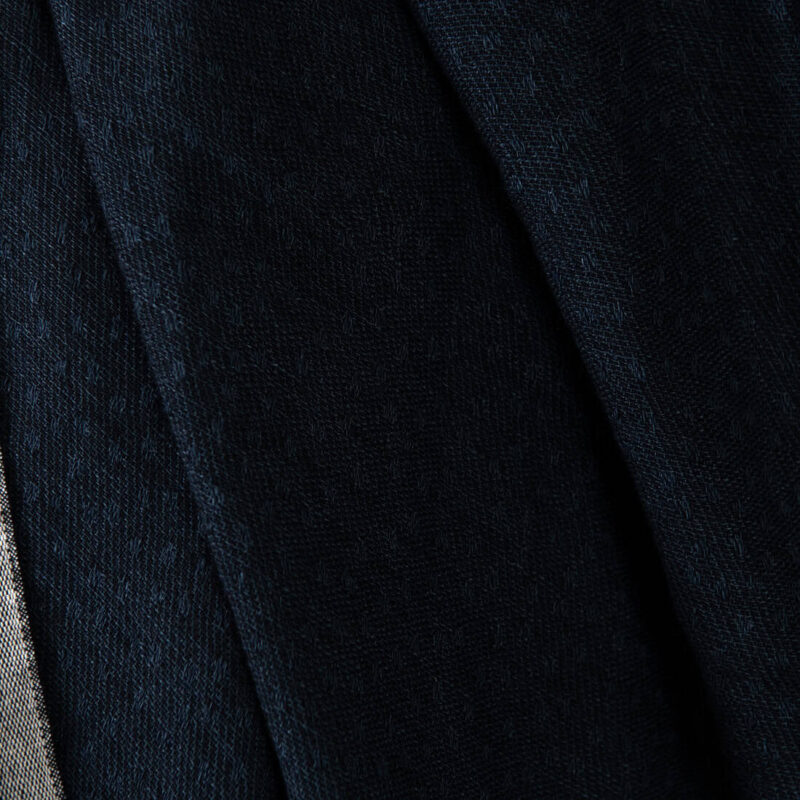 Washed linen wool fabric black with dark blue dots, jacquard