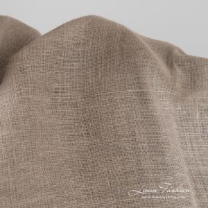 Linen fabric woven from undyed yarns