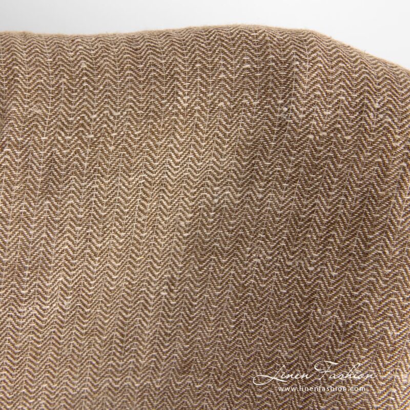 Brown linen fabric in herringbone pattern